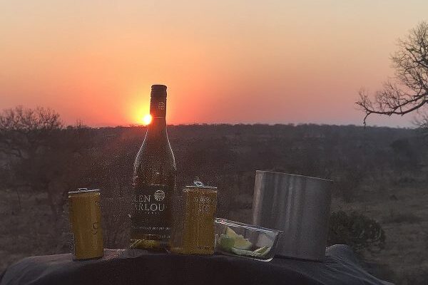 Sundowners in the bush with a beautiful sunset