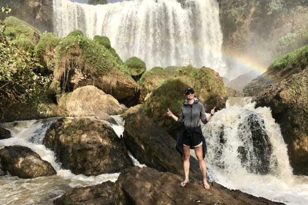 Cooling off beside waterfalls in Vietnam, after motorbiking hundreds of miles in a day to make it to a ferry leaving the Mekong river!