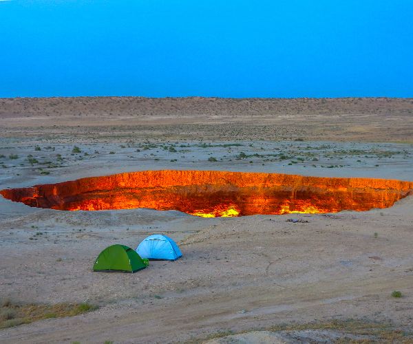 Overnight camping in the Darvaza Gas Crater, Turkmenistan is a unique experience